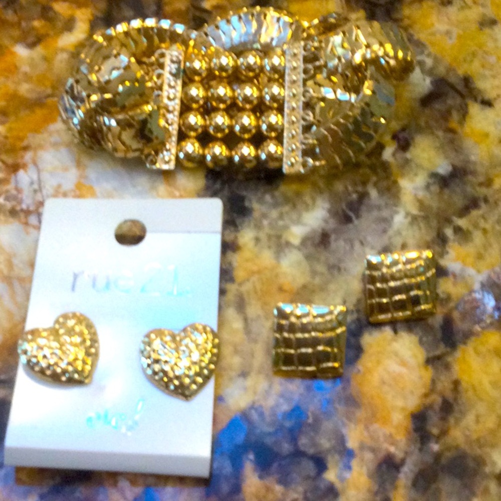 Gold bracelet and two pairs of earrings